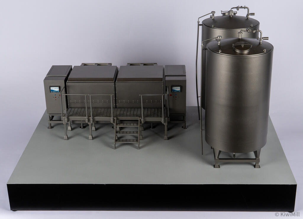 Front view of the sous vide cook tank model with both lids closed and red and blue push buttons on the end cabinets